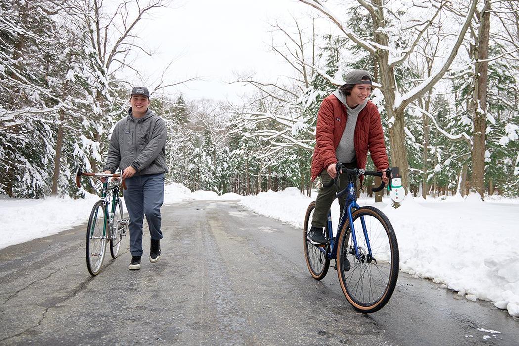 Lucas Beyer standing with his bike